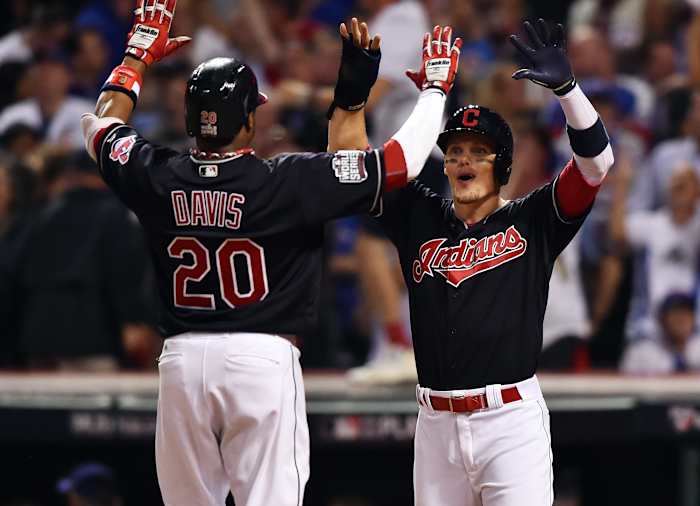 Nov 2, 2016; Cleveland, OH, USA; Cleveland Indians center fielder Rajai Davis (20) is congratulated by teammate Brandon Guyer (6) after hitting a two-run home run against the Chicago Cubs in the 8th inning in game seven of the 2016 World Series at Progressive Field. Mandatory Credit: Ken Blaze-USA TODAY Sports